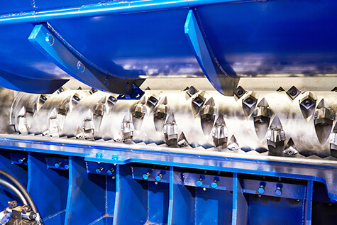 High-Quality Gear Couplings for Highest Torque Transmissions between Grinder and Motor in Wood Grinding Plants | RINGFEDER®